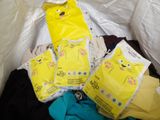 a pile of clothes with a cat design on them