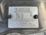 a close up of a metal plate with numbers on it