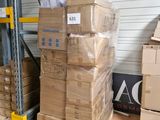 a large stack of boxes sitting on a pallet in a warehouse