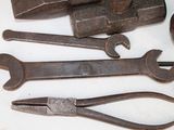 a lot of tools that are sitting on a table
