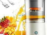 a juicer that has a glass of orange juice next to it