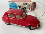 a toy car that is connected to a power cord