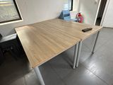 a table with a remote control on it in a room