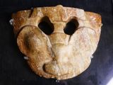 a bread mask made to look like a lion ' s head