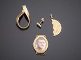 a close up of a picture of a man ' s face on a watch and other items