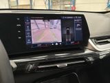 a picture of a car dashboard with a camera mounted on it