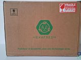 a cardboard box with a logo on it on a table