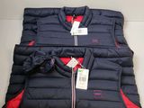 a group of three jackets sitting on top of each other