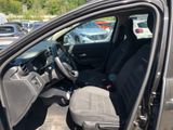 the interior of a car with the driver ' s seat folded down