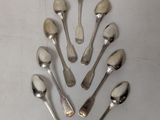 a lot of spoons and forks arranged in a circle
