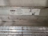 an image of a metal shelf with a label on it