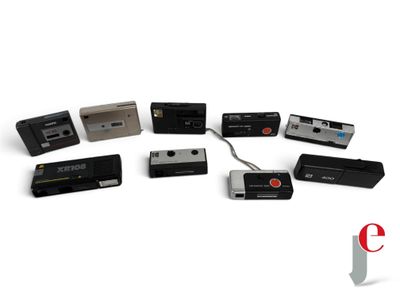 many different types of electronic devices on a white surface