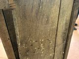 a close up of a wooden door on the floor