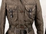 an image of a jacket on a mannequin stand