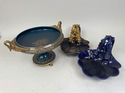 a blue bowl and a blue plate on a white table