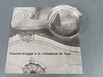 a magnifying lens sitting on top of a book