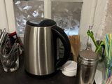 an image of a coffee pot sitting on a counter