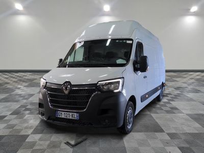la photo d'une camionnette blanche sur un sol en damier