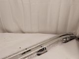 a pair of skis that are sitting on a bed
