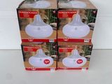 three boxes of air freshener sitting on top of a white table