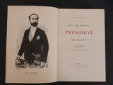 an open book with a picture of a man in a suit and tie