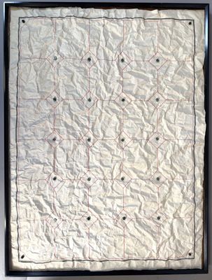 an image of a picture of a piece of paper with holes in it