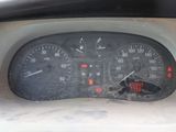 a close up of a speedometer in a car