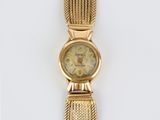 an image of a close up of a wrist watch on a white surface