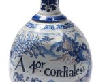 a blue and white vase with a blue and white design on it