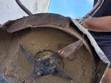a man that is working on a piece of metal