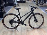 a bike that is sitting on a stand in a store