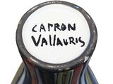 a black and white vase with the word capron valianus written on it