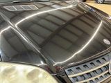 an image of a car that is shiny in a showroom