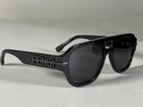 the sunglasses are black and have black lenses on them