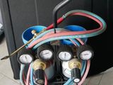 une photo d'un petit compresseur d'air monté sur un chariot