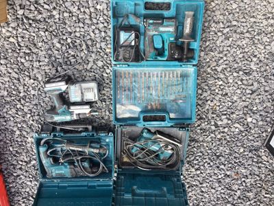 two tools that are sitting on the floor