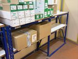 boxes and boxes on a shelf in a warehouse