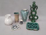 many different vases that are sitting on a table