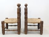 pair of antique wooden chairs with rope seat and back
