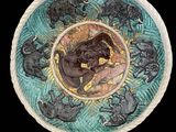 une image représentant une assiette décorative ornée d'éléphants