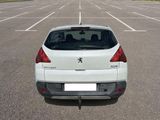 a white car that is parked in a parking lot