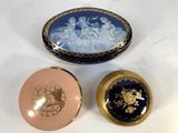 three different types of decorative boxes sitting on a white surface