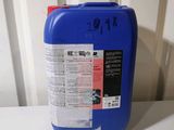 a blue plastic container with a red handle on a white table