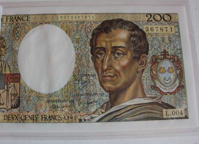 a picture of a paper banknote with a picture of a man on it