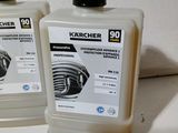 two bottles of karcher ' s car wash sitting on a counter