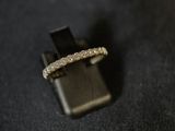 a close up of a ring on a black surface