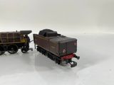 two toy trains on a white surface with a white background