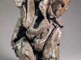 a sculpture of a man with a hat on his head