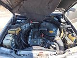 a car engine with its hood open and the hood open