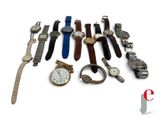 many different types of watches on a white surface
